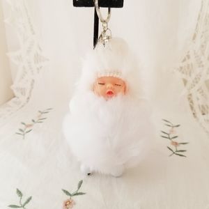 Baby Face White Pom Pom Keychain. New